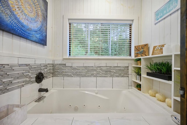 bathroom featuring a jetted tub