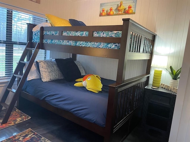 bedroom featuring wood finished floors