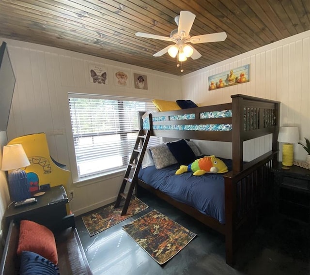 bedroom featuring wood ceiling and ceiling fan