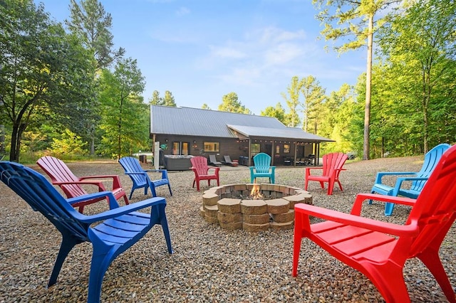 view of patio / terrace featuring a fire pit