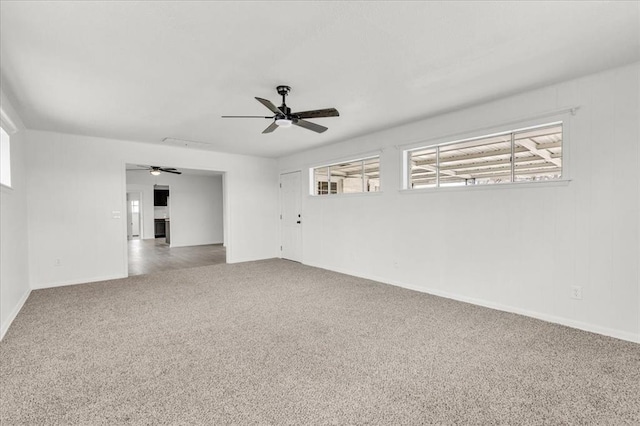 10313 N Mckinley Ave, Oklahoma City, OK 73114 - carpeted empty room with a ceiling fan and baseboards