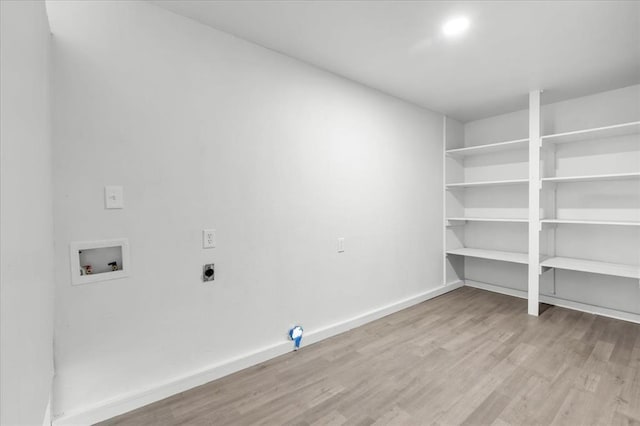 10313 N Mckinley Ave, Oklahoma City, OK 73114 - clothes washing area featuring hookup for an electric dryer, hookup for a washing machine, baseboards, laundry area, and wood finished floors
