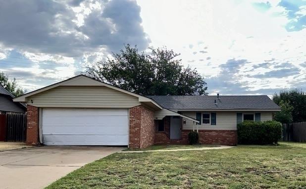 ranch-style house with concrete driveway, brick siding, an attached garage, and a front lawn