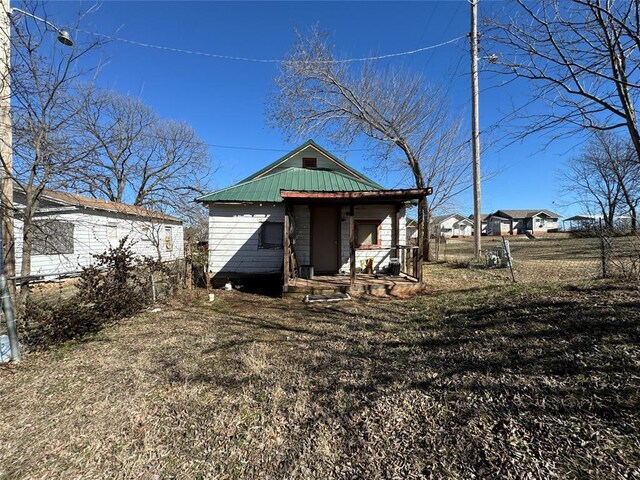 view of outbuilding featuring a porch