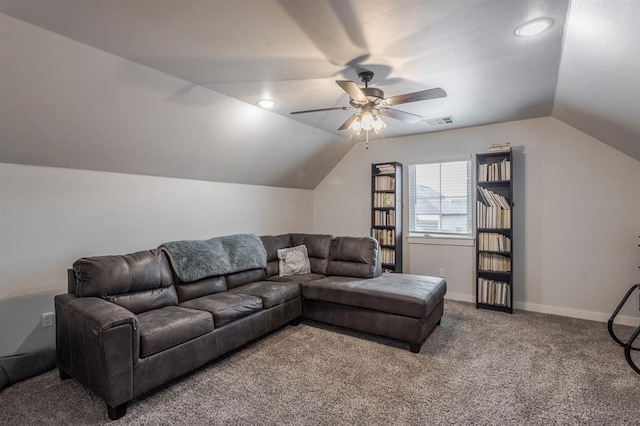 carpeted living room with visible vents, baseboards, a ceiling fan, and vaulted ceiling