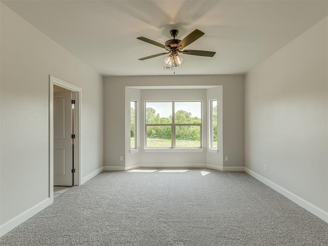 10124 Gentry Xing, Oklahoma City, OK 73169 - unfurnished room featuring carpet floors and a ceiling fan