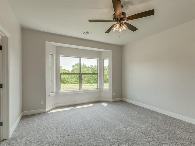 10124 Gentry Xing, Oklahoma City, OK 73169 - carpeted empty room featuring a ceiling fan and baseboards