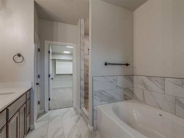 10124 Gentry Xing, Oklahoma City, OK 73169 - full bathroom with marble look tile flooring, a bath, vanity, and a shower