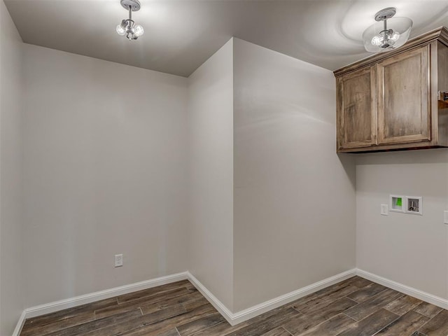 10124 Gentry Xing, Oklahoma City, OK 73169 - washroom featuring dark wood-style flooring, washer hookup, and cabinet space