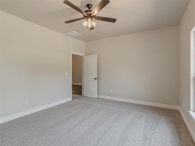10124 Gentry Xing, Oklahoma City, OK 73169 - unfurnished room featuring light colored carpet and a ceiling fan