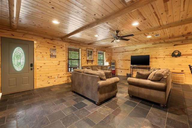 living room featuring wooden walls, wood ceiling, stone tile flooring, beam ceiling, and recessed lighting