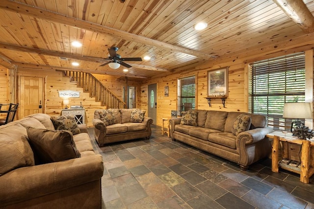 living room with ceiling fan, wooden ceiling, recessed lighting, wood walls, and stairs