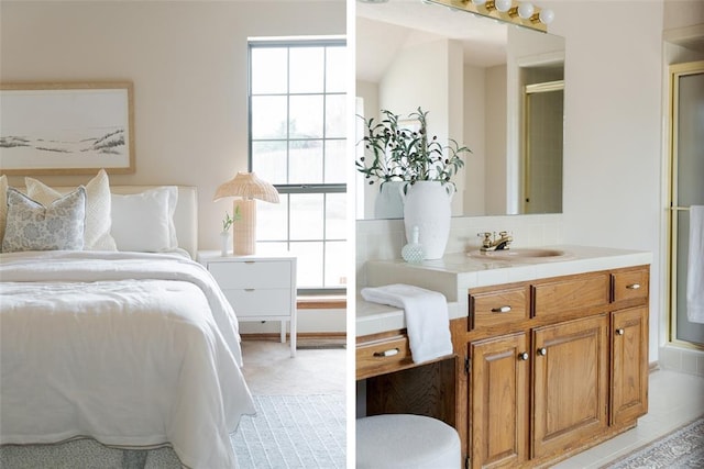 bedroom featuring a sink and light carpet
