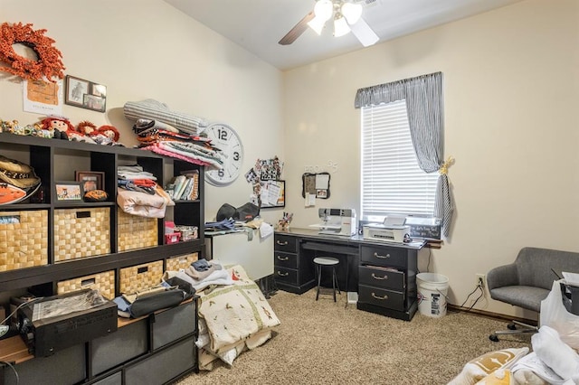 home office featuring ceiling fan and baseboards