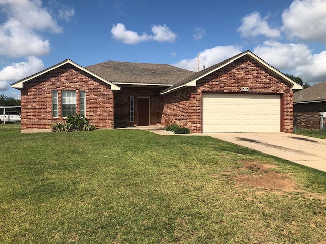 single story home featuring brick siding, roof with shingles, a front yard, a garage, and driveway