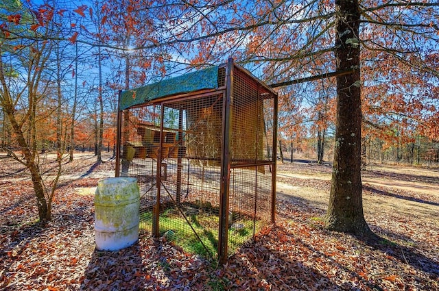 view of yard with an outdoor structure and exterior structure