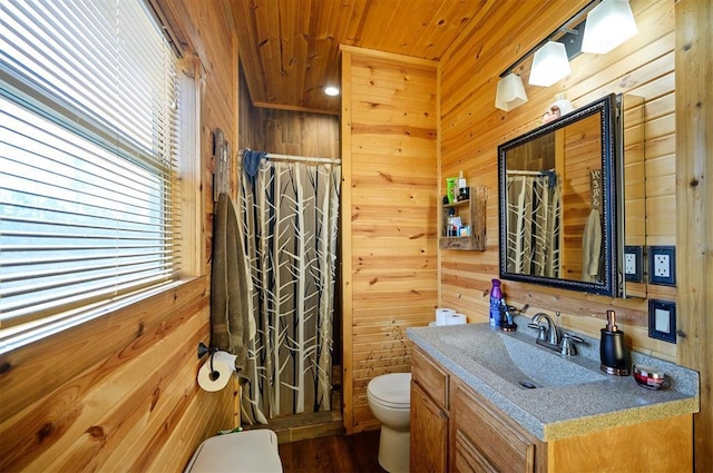 full bath featuring toilet, wood ceiling, curtained shower, vanity, and wood walls