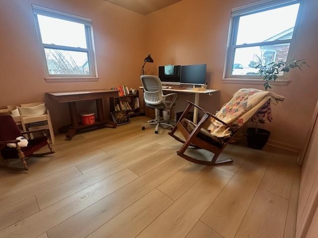 office area with light wood-style flooring