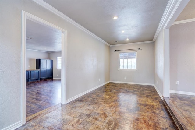 spare room with recessed lighting, baseboards, wood finished floors, and ornamental molding