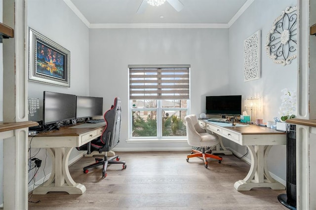 office featuring baseboards, a ceiling fan, wood finished floors, and crown molding