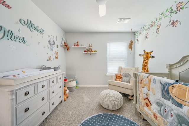 bedroom with baseboards, visible vents, and carpet floors