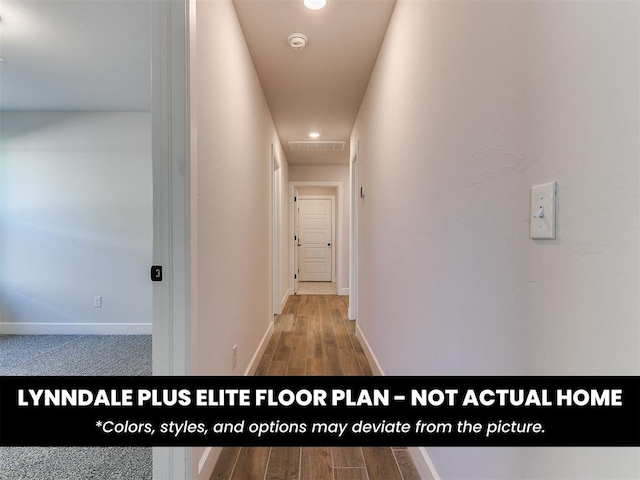 hallway with wood finished floors, recessed lighting, visible vents, and baseboards