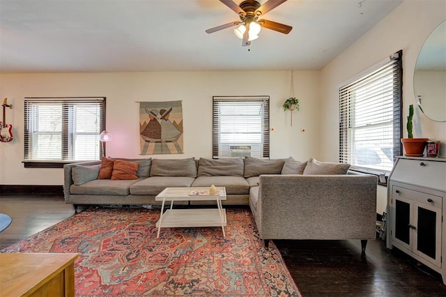 1721 NW 29th St, Oklahoma City, OK 73106 - living area with dark wood-style floors, plenty of natural light, ceiling fan, and baseboards