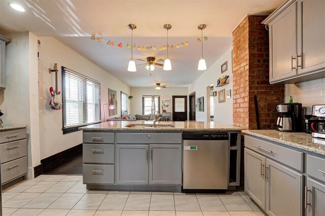 1721 NW 29th St, Oklahoma City, OK 73106 - kitchen with gray cabinets, dishwasher, a sink, a peninsula, and ceiling fan