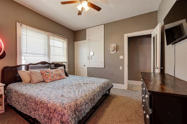 1721 NW 29th St, Oklahoma City, OK 73106 - bedroom with light colored carpet, a ceiling fan, and baseboards