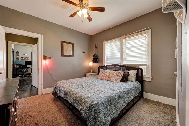 1721 NW 29th St, Oklahoma City, OK 73106 - bedroom featuring baseboards, a desk, carpet, and a ceiling fan