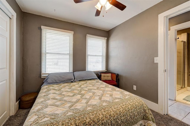 1721 NW 29th St, Oklahoma City, OK 73106 - carpeted bedroom with a ceiling fan and tile patterned flooring