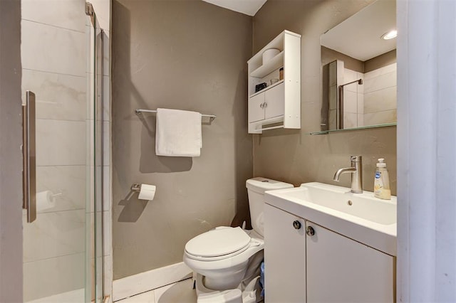 1721 NW 29th St, Oklahoma City, OK 73106 - full bath featuring toilet, a shower stall, vanity, and baseboards