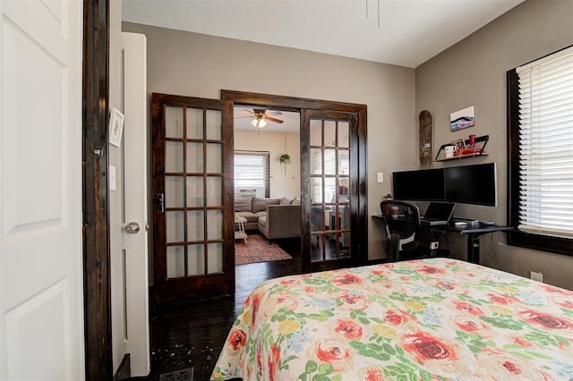 1721 NW 29th St, Oklahoma City, OK 73106 - bedroom featuring multiple windows, french doors, and wood finished floors