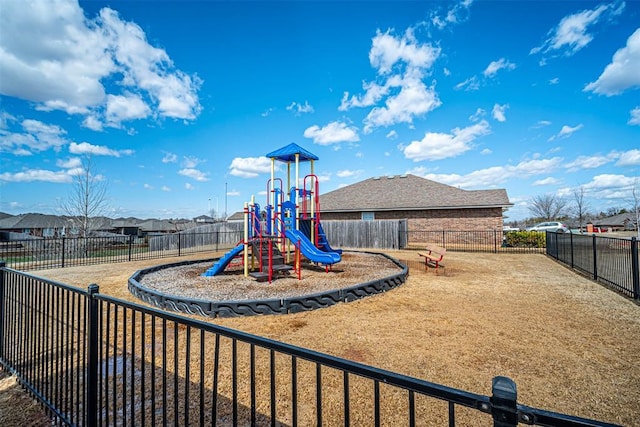 communal playground featuring fence