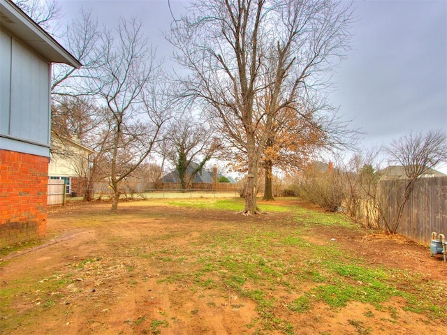 view of yard featuring fence