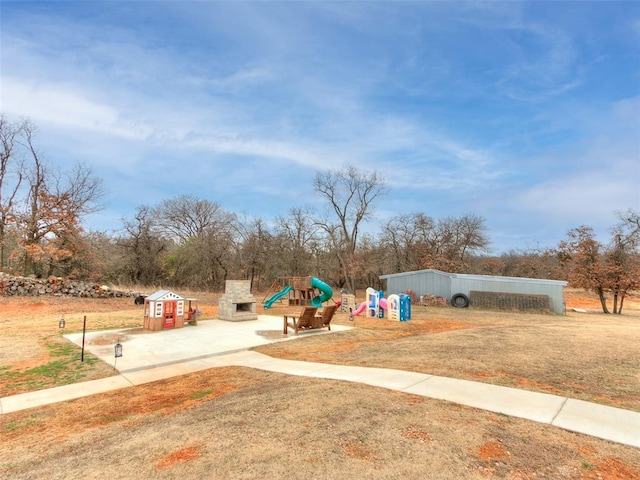 community play area with a lawn