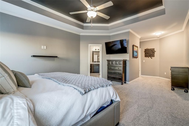 bedroom featuring light carpet, a raised ceiling, crown molding, baseboards, and ceiling fan