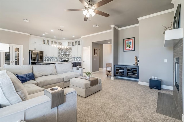 living room featuring baseboards, french doors, light colored carpet, and ornamental molding