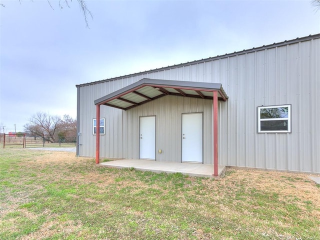 view of outdoor structure featuring fence