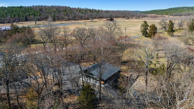 aerial view with a rural view and a view of trees