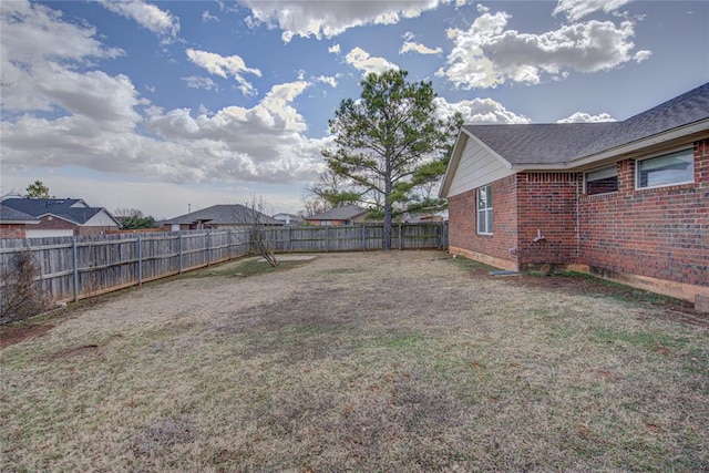 view of yard featuring a fenced backyard