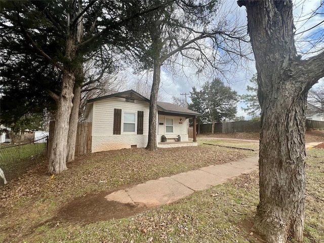 view of front of property with fence