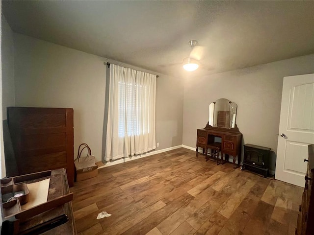 miscellaneous room featuring wood finished floors