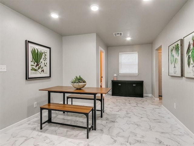 interior space with marble finish floor, baseboards, visible vents, and recessed lighting