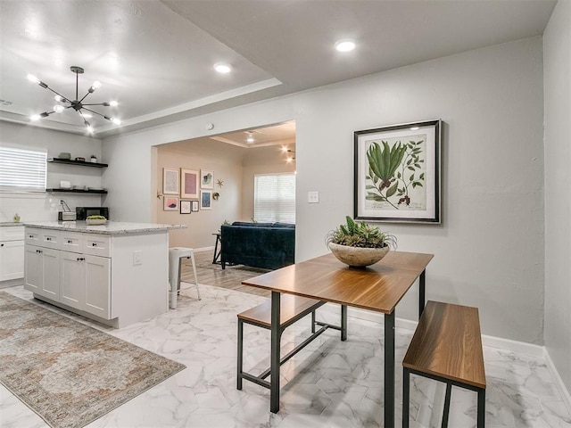 kitchen featuring marble finish floor, white cabinets, baseboards, and open shelves