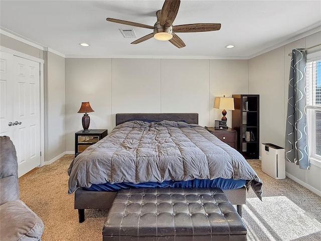 carpeted bedroom with crown molding, recessed lighting, visible vents, a ceiling fan, and baseboards