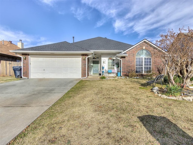 single story home featuring a garage, brick siding, fence, concrete driveway, and a front lawn