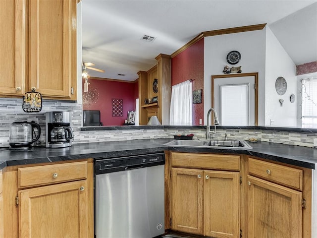 kitchen featuring a sink, dark countertops, visible vents, and dishwasher