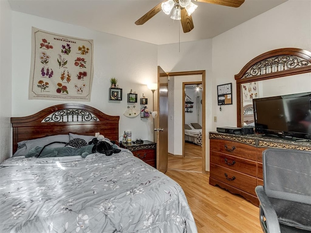 bedroom with a ceiling fan and light wood finished floors