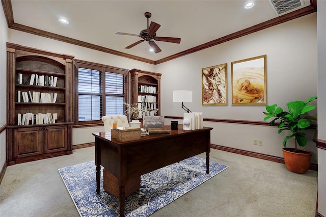 office area with baseboards, visible vents, a ceiling fan, and light colored carpet